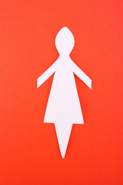 Papper kvinna på röd bakgrund — Stockfoto