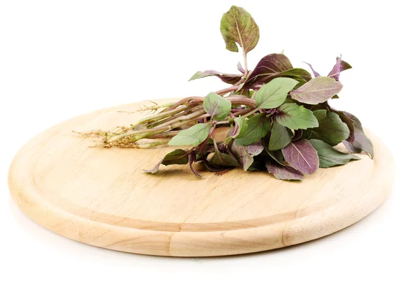 Fresh basil on wooden board isolated on white — Stock Photo, Image