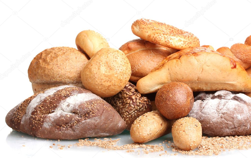 Delicious breads and wheat isolated on white