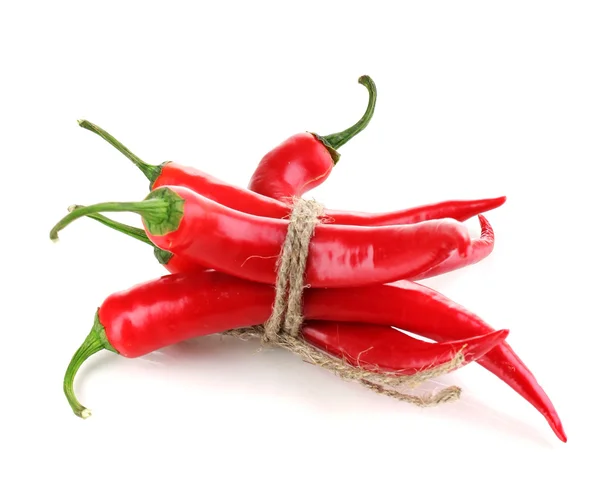 Red hot chili peppers holtversenyben elszigetelt fehér kötél — Stock Fotó