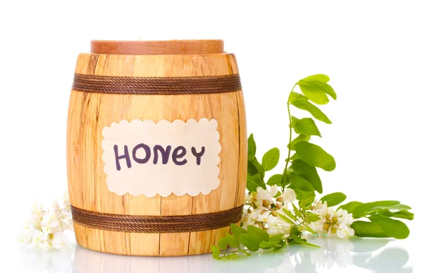 Sweet honey in barrel with acacia flowers isolated on white — Stock Photo, Image