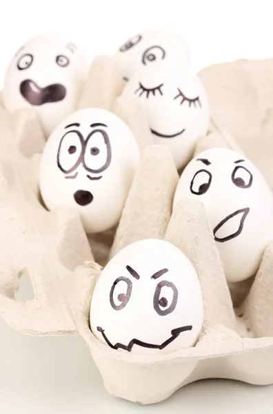 Komik suratlar ile beyaz yumurta — Stok fotoğraf