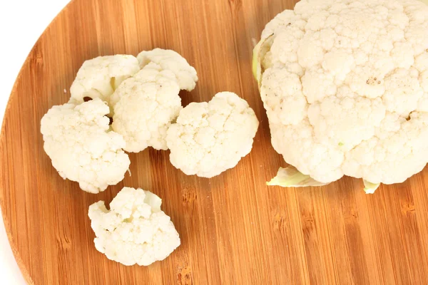 Fresh cauliflower on wooden board isolated on white — Stock Photo, Image