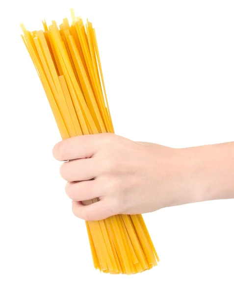Pasta in een hand geïsoleerd op wit — Stockfoto