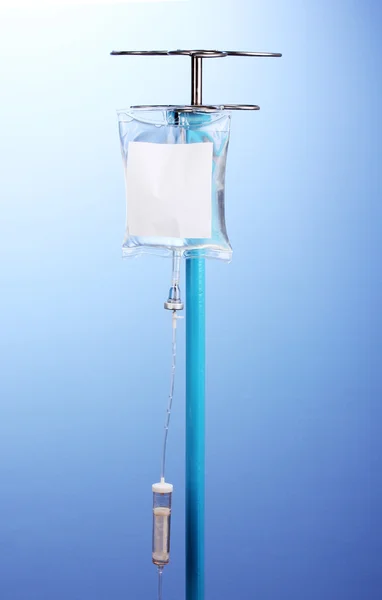 Intravenous therapy on blue background — Stock Photo, Image