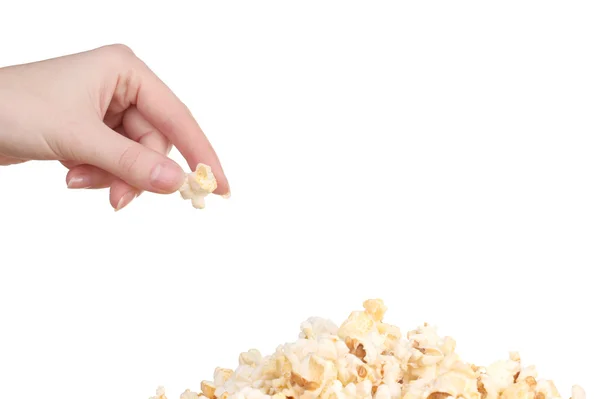 Hand picking a tasty popcorn — Stock Photo, Image