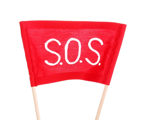 SOS sinal escrito em pano vermelho isolado em branco — Fotografia de Stock