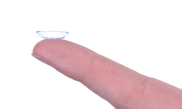 Lentille de contact sur doigt isolé sur blanc — Photo