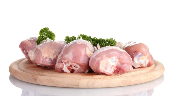 Raw Chicken Drumsticks with parsley on cutting board isolated on white — Stock Photo, Image