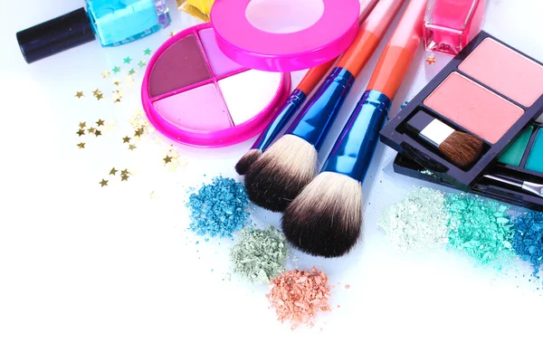 Eye shadow, nail polish and make-up brushes isolated on white — Stock Photo, Image
