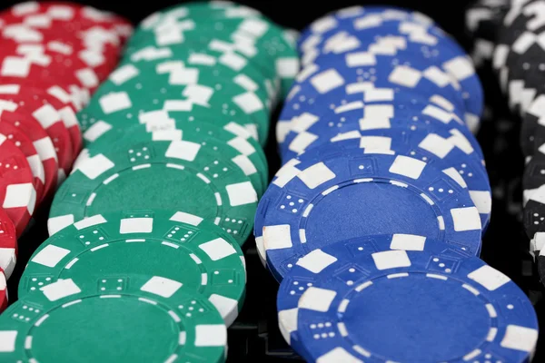 Casino chips close-up isolated on black — Stock Photo, Image