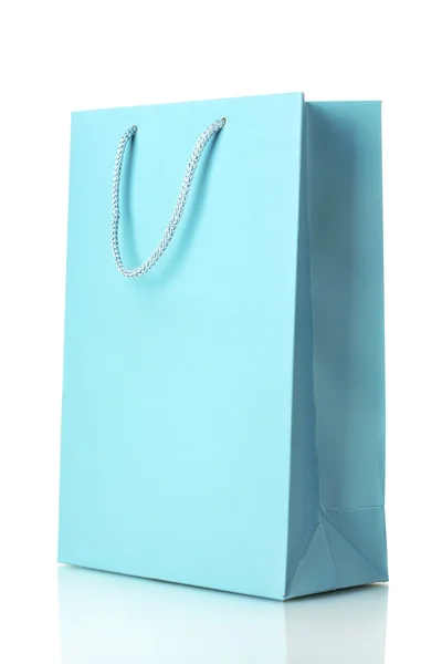Blå shoppingväska isolerad på vit Stockbild
