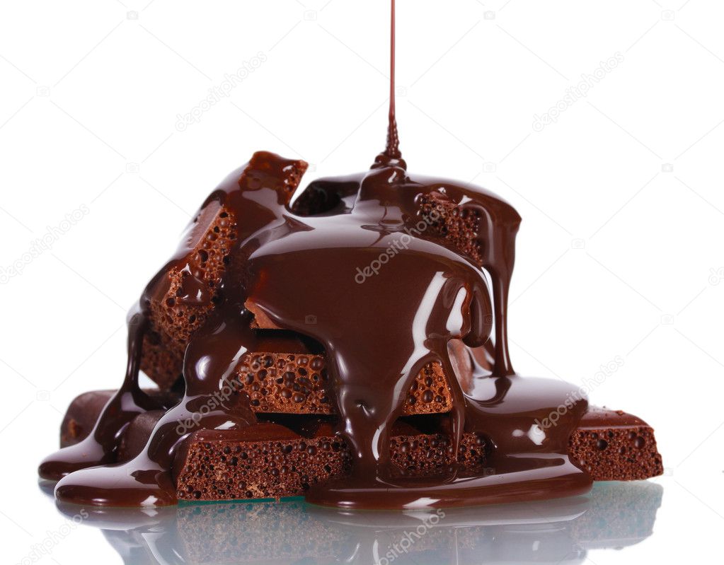 Slices of milk and dark chocolate bar poured chocolate isolated on white