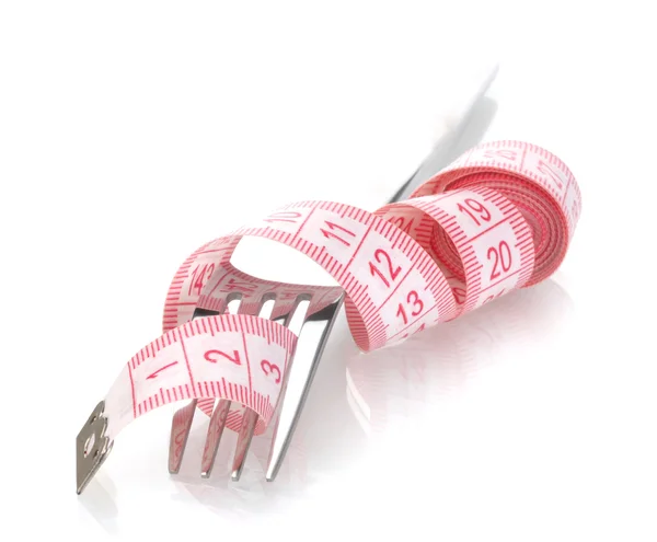 Tenedor y cinta métrica aislados en blanco —  Fotos de Stock