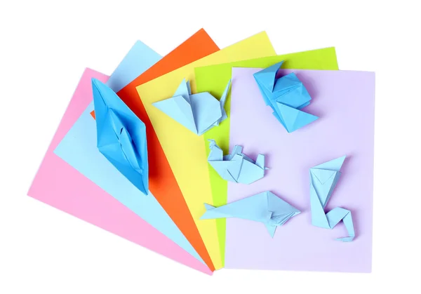 Origami azul sobre papel brillante, aislado sobre blanco —  Fotos de Stock