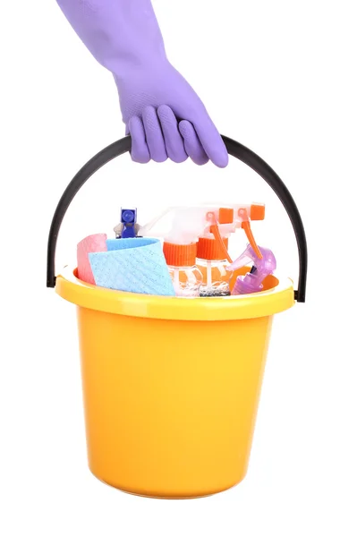 stock image Bucket with cleaning items in hand isolated on white