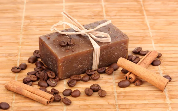 Hand-made soap on wooden mat — Stock Photo, Image