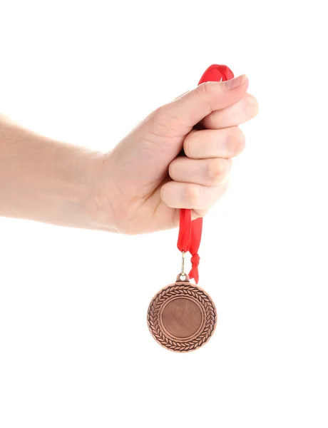 Medalha de bronze na mão isolada em branco — Fotografia de Stock