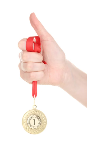 Médaille d'or à la main isolée sur blanc — Photo