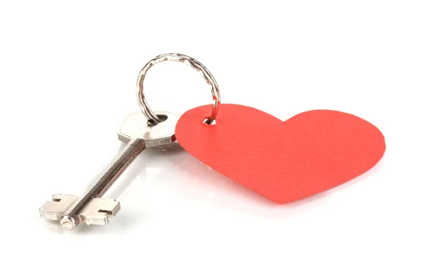 Nyckel med hjärtformad berlock isolerad på vit — Stockfoto