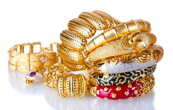 Beautiful golden bracelets isolated on white — Stock Photo, Image