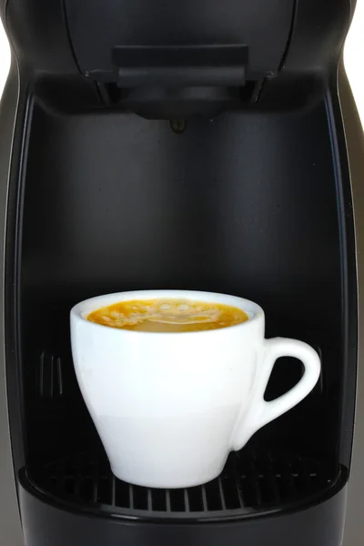 Espresso machine and cup of coffee — Stock Photo, Image