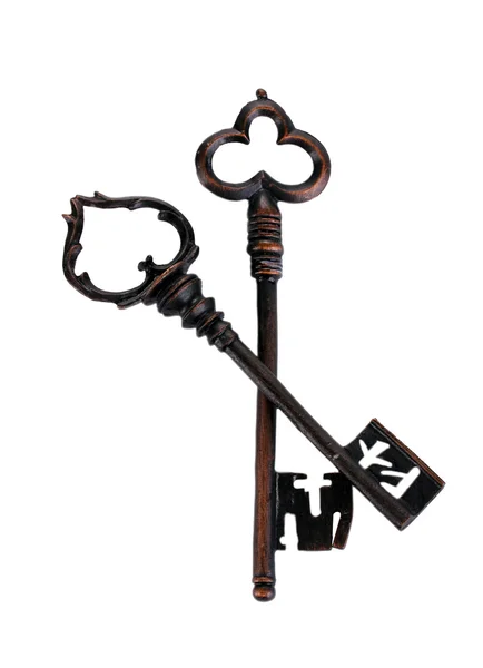 Twee antieke sleutels geïsoleerd op wit — Stockfoto