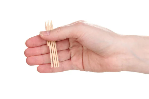 Toothpicks in hand isolated on white — Stock Photo, Image