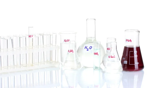 Test tüpleri ile üzerine beyaz izole çeşitli asitler — Stok fotoğraf