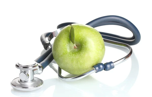 Медицинский стетоскоп и зеленое яблоко изолированы на белом Стоковая Картинка