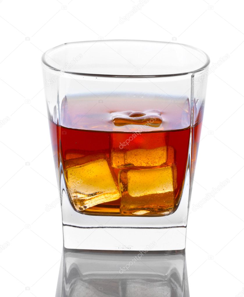 Glass of whiskey and ice isolated on white