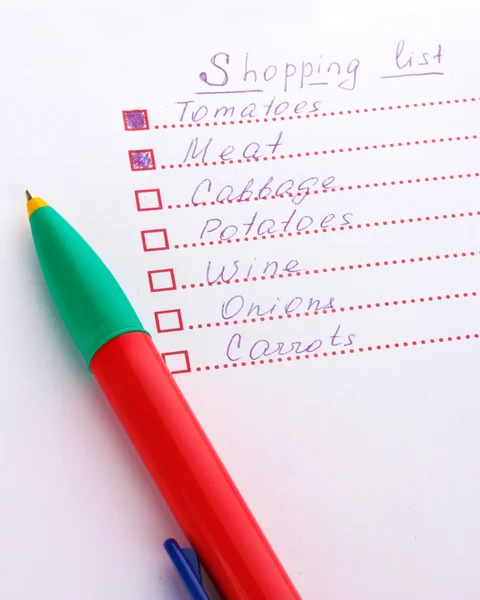 Shoping list and pen closeup — Stock Photo, Image