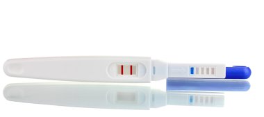 Positve pregnancy test isolated on white clipart