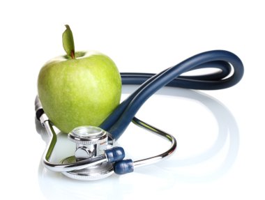 sağlık stetoskop ve yeşil elma üzerine beyaz izole