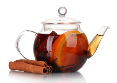 Glass teapot with black tea of orange and cinnamon isolated on white clipart