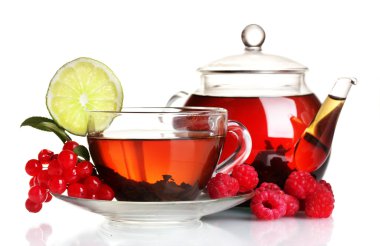 Black fruit tea in glass teapot and cup isolated on white clipart