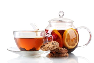 Black fruit tea in glass teaopot and cup isolated on white clipart