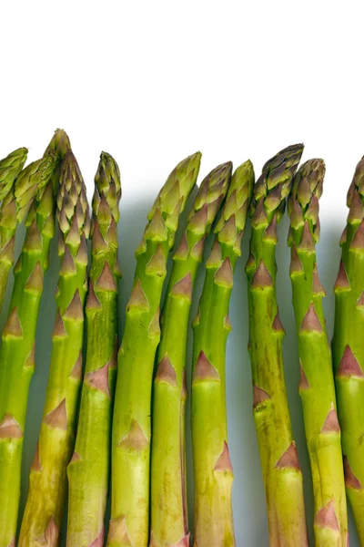 stock image Delicious fresh asparagus isolated on white
