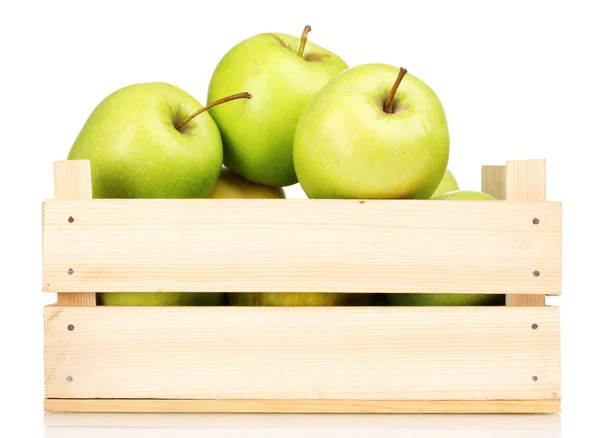 stock image Juicy green apples in a wooden crate isolated on white