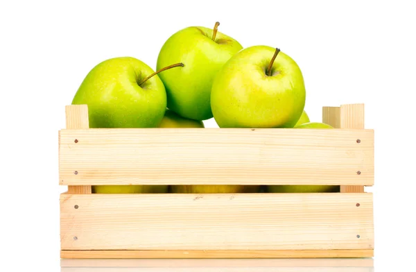 Juicy green apples in a wooden crate isolated on white — Stock Photo, Image
