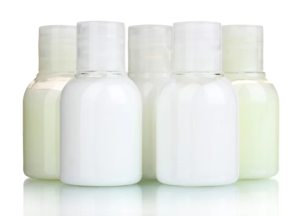 Små kosmetika flaskor isolerad på vit — Stockfoto