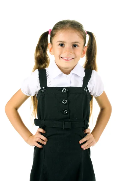 Vacker liten flicka i skoluniform isolerad på vit — Stockfoto