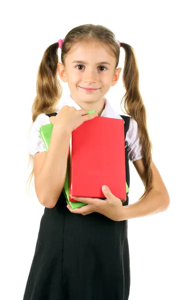 Gyönyörű kicsi lány iskola egységes és elszigetelt fehér könyvek — Stock Fotó