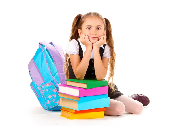 Piękne dziewczynki, książki i plecak na białym tle — Zdjęcie stockowe