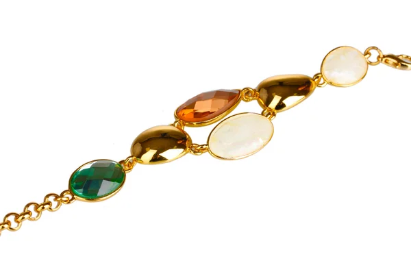 Beautiful golden bracelet with precious stones isolated on white — Stock Photo, Image