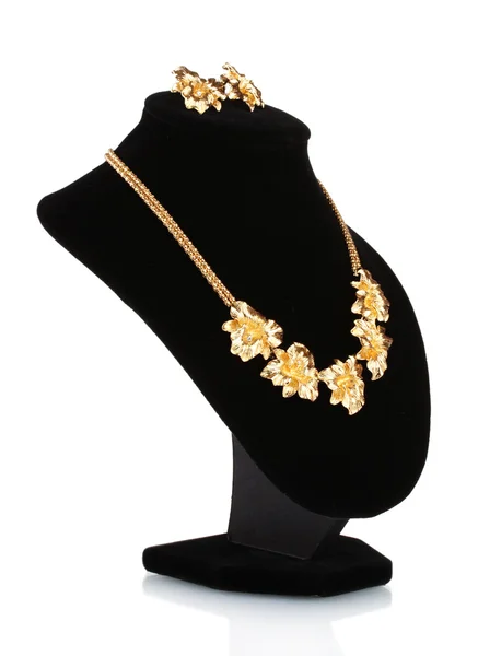 Beautiful gold necklace with diamond and earrings on mannequin isolated on — Stock Photo, Image