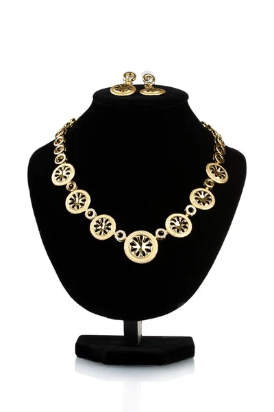 Magnifique collier en or avec diamant et boucles d'oreilles sur mannequin isolé sur — Photo