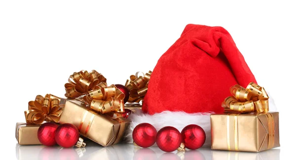 Beautiful Christmas hat, gifts and Christmas balls isolated on white — Stock Photo, Image