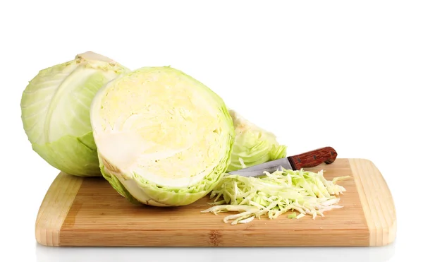 Green cabbage shredded on wooden board isolated on white — Stock Photo, Image