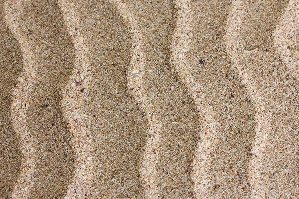 Onde sullo sfondo di sabbia — Foto Stock